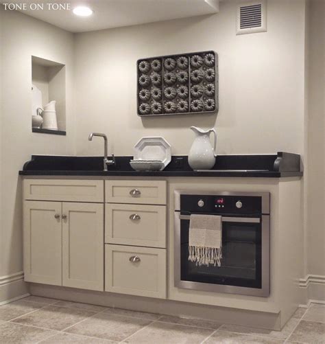 The modern kitchen appliances accentuate the interior of your kitchen. Our Basement Renovation | Basement renovations, Basement ...