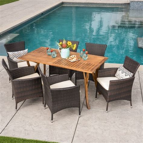 Shop Bennett Outdoor 7 Piece Acacia Wood Wicker Dining Set By