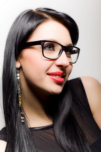 Premium Photo Young Brunette Woman In Black Clothing And Glasses