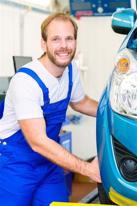 Car Mechanic And Auto In Service Workshop Stock Photo Image Of Male