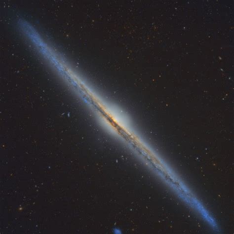 Magnificent Spiral Galaxy Ngc 4565 Is Viewed Edge On From Planet Earth