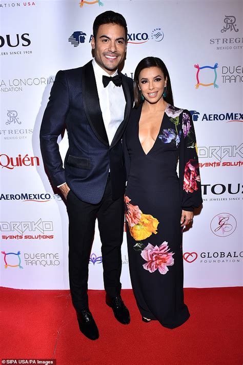 Eva Longoria Dons Plunging Floral Dress As She Attends The 5th Global