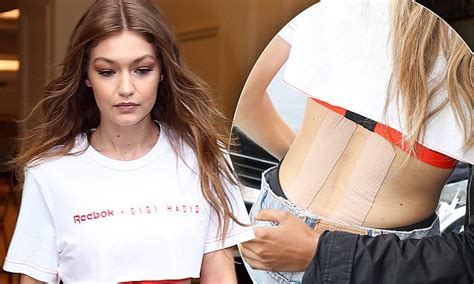 Gigi Hadid Reveals Two Large Tape Strips Down Her Back As She Steps Out In Sydney In A Crop Top