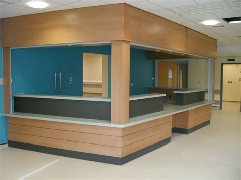 Local Hospital Aande Reception Desk In Beech Veneer With Bulkhead