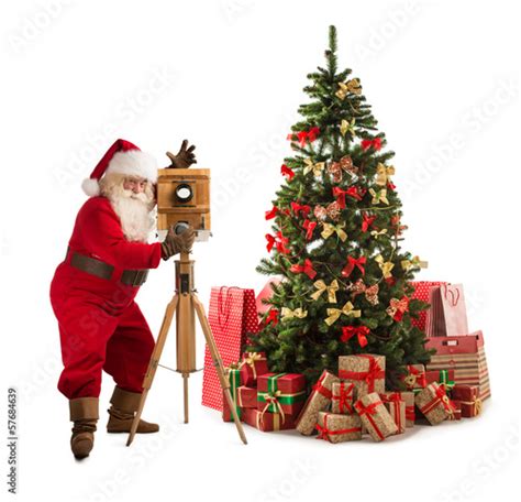 Santa Claus Taking Picture With Old Wooden Camera Standing Near