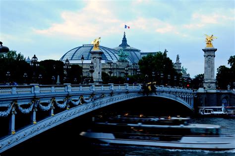 This photo has been manipulated by removing distractions such as cleaning the dirty street which is always full of chewing. Ponte Alexander III bridge over Seine River, Paris. | Flickr