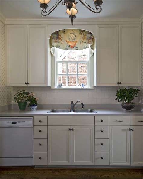 Plus when the cabinets are painted to blend into the wall. Window Treatments for Small Windows in Kitchen - HomesFeed