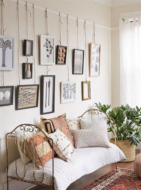See the full tutorial and supply list here. Hanging Art on a Picture Rail
