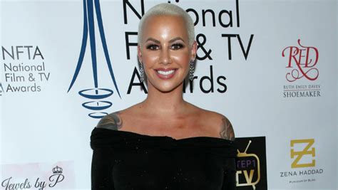 Amber Rose Gets Massive Face Tattoo To Honor Her Sons See The Ink Iheart