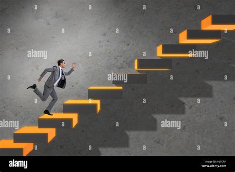 Young businessman climbing career ladder Stock Photo - Alamy