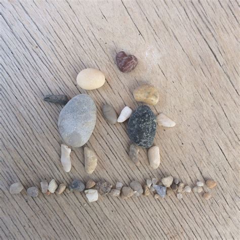 Beach pebble art ☀️ ️ #love #pebbles #pebbleart #beachart #holiday # ...