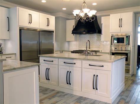White cabinets also pair well with many popular styles, including farmhouse kitchen designs. White Shaker Kitchen Cabinets » Alba Kitchen Design Center ...
