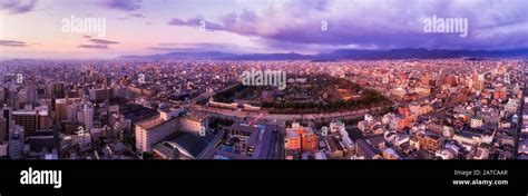 Wide Aerial Panorama Over Kyoto City At Sunrise From Distant Kyoto