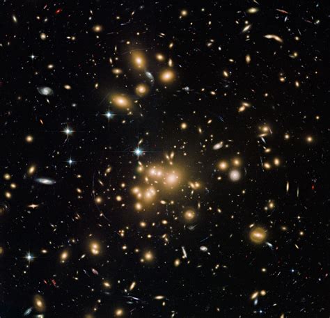Hubble Captures Amazing Images Of Massive Galaxy Cluster Space