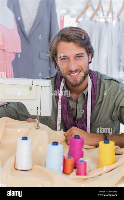 Fashion Designer Using Sewing Machine Stock Photo Alamy