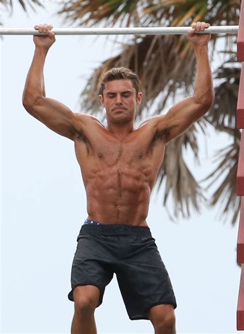 zac efron looks ripped as he goes shirtless to complete obstacle course on set of baywatch movie