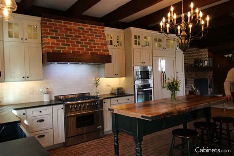 Brick floor kitchen, white kitchen cabinets, kitchen beams, beams in kitchen, curved archways, white spanish farmhouse kitchen. Pin by Sheri Starks on kitchen | Brick kitchen, Farmhouse ...