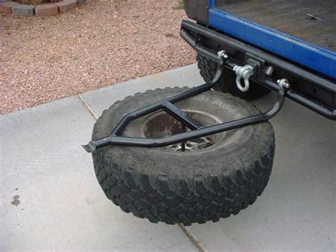 New Swing Down Tire Carrier Jeep Accessories Jeep Xj Mods Jeep Mods