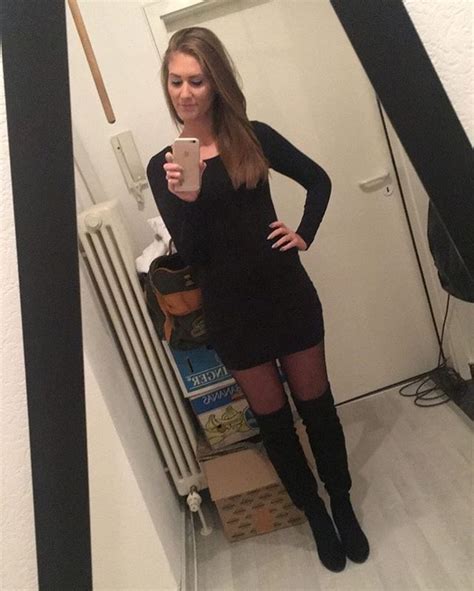 Black Thigh High Boots Over Dark Pantyhose Combined With Short Black Dress Mirror Selfie