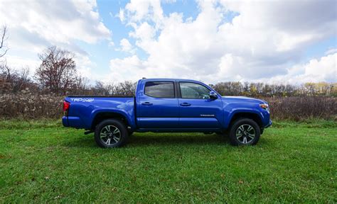 Retrax bed cover, tailgate lock, trd exhaust. Daily Driving the 2016 Toyota Tacoma TRD Sport 4x4