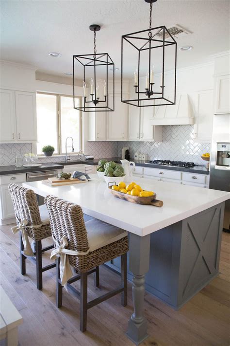 Due to restrictions based on our ceiling, the light fixture will hang from one cord and spread over the island in a linear fashion. Metal Pendant Lights Over Kitchen Island | HGTV