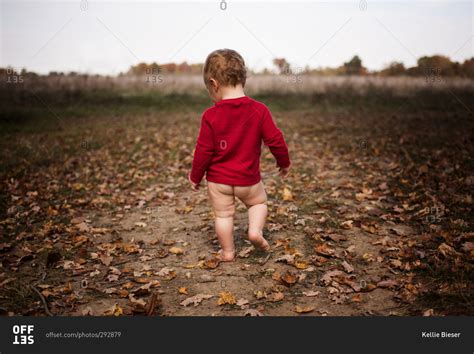Bare Bottom Toddler Walking In Countryside Stock Photo Offset