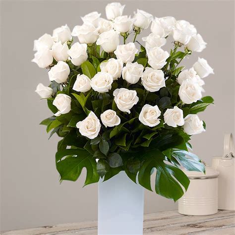 Flower Arrangement Of White Roses