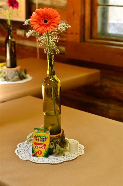 Simple Gerbera Daisy And Babys Breath In A Wine Bottle Made An Elegant