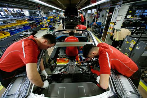 File Photo Employees Of German Car Manufacturer Porsche Work On A
