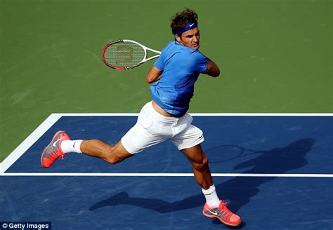 Federer goes long with a forehand as he moved forehand. US OPEN 2013: Roger Federer cruises into third round ...