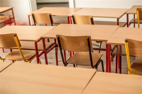 Chairs And Tables Inside Empty Classroom In Primary School Stock Image