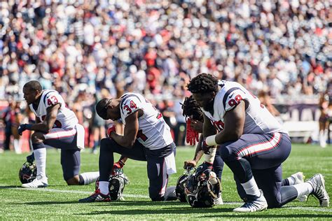 Nfl Players Take A Kneel During The National Anthem