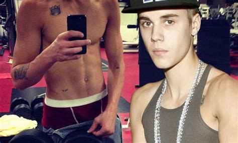 Justin Bieber Flexes His Muscle In Shirtless Snap At The Gym Trying