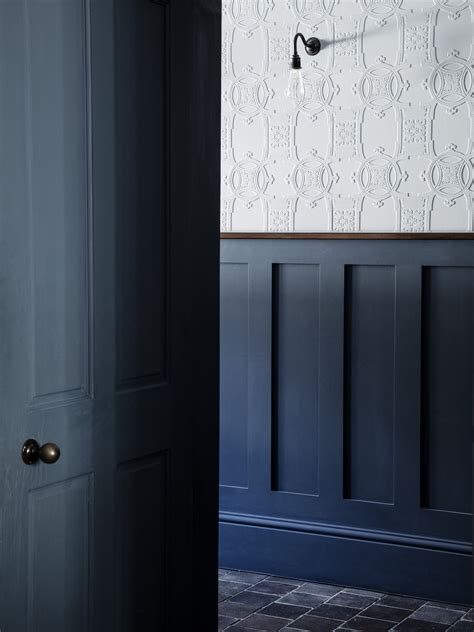 In The Main Hallway Anaglypta Wallpaper Is Combined With Painted Wooden