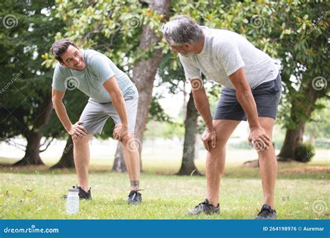 Men Bending Over As They Recover Stock Photo Image Of Breathing Training