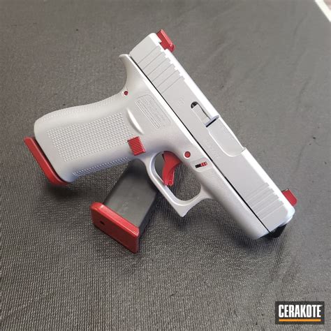 Two Toned Glock Coated With Satin Aluminum And Ruby Red Cerakote
