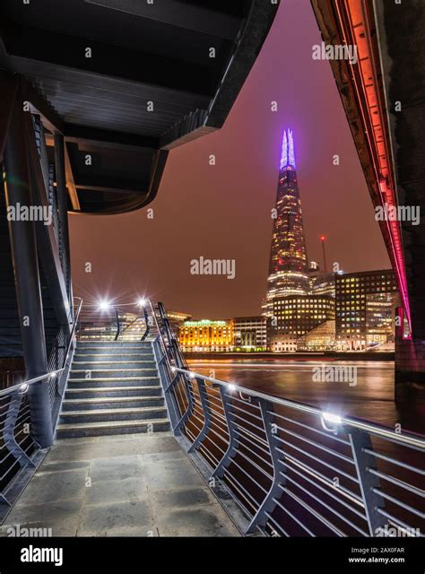 The Shard In London At Night Taken From Beneath London Bridge Stock