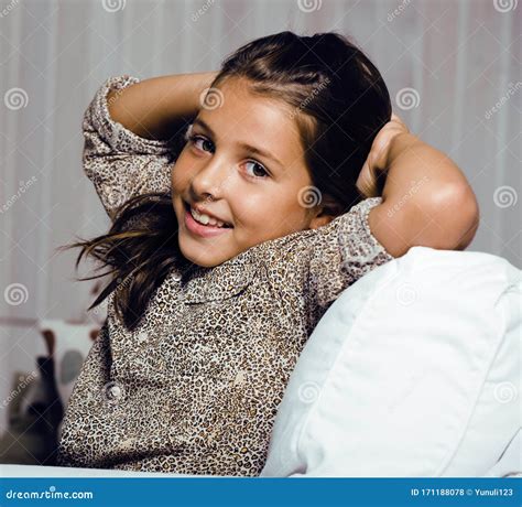 Little Cute Brunette Girl At Home Interior Happy Smiling Closeup