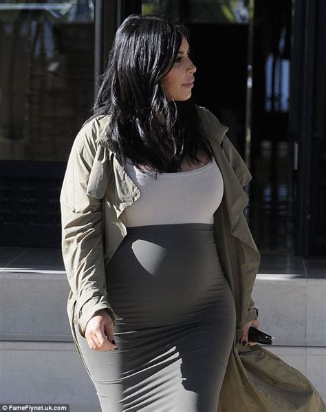 kim kardashian reveals huge bump as she squeezes into another skintight dress