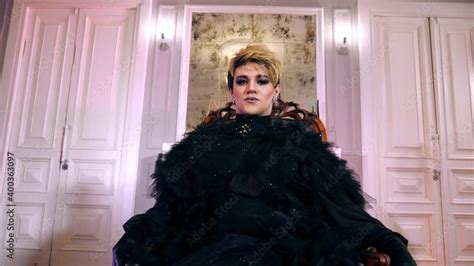 Transsexual Proud Looking At Camera Makeup Trans Lgbt Black Dress Bisexual Man Sitting Throne