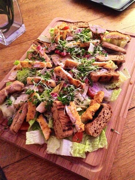 Spread into an even layer on one half of tray. Crispy Polenta Chicken Caesar Salad using gluten free ...