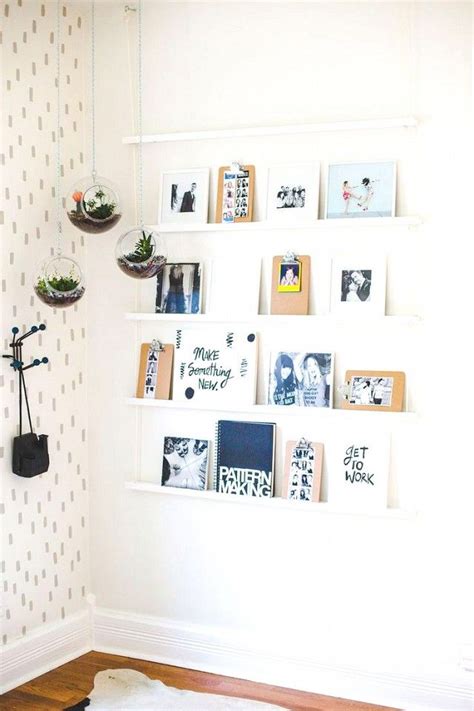 This Easy Yet Chic Way To Display Art At Home Requires Zero Nails