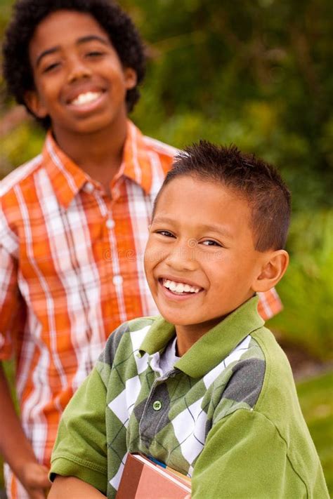 Happy Young Kids Smiling And Laughing Stock Photo Image Of Boys