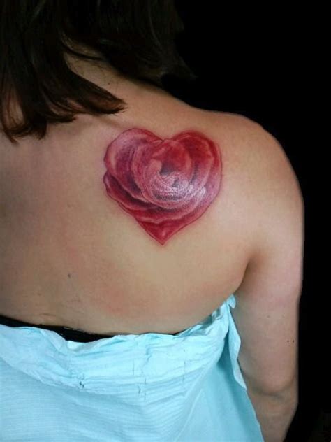 Or, just a perfect place to have a tiny blue rose tattoo. Rose heart tattoo shoulder | Heart tattoo, Rose heart ...
