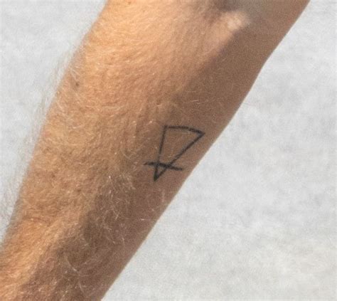 Shirtless Armie Hammer Reveals New Tattoo In Rare Outing Before New