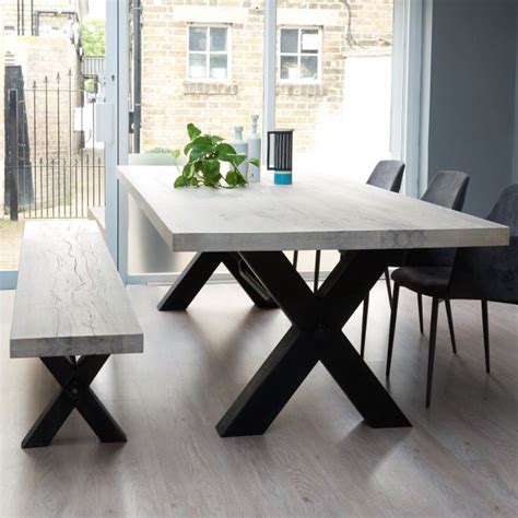 Gate legged dining tables have been around for a long time now, and they still provide a good answer for small homes that lack an area in which to set up a long table permanently. From Stock: Rustik Wood & Metal Dining Table, Cross-Frame ...