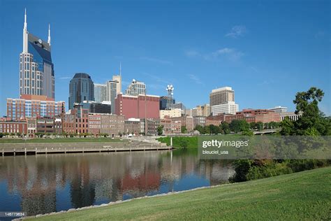 Nashville Skyline Reflected In Water In Foreground High Res Stock Photo