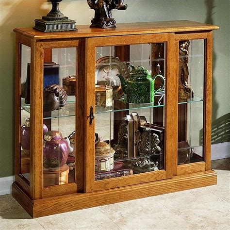 Overall, alamos console curio cabinet has excellent value and recommended as a must buy for anyone who looking for a great product. Pulaski Golden Oak III Console Curio Display Cabinet - 6715
