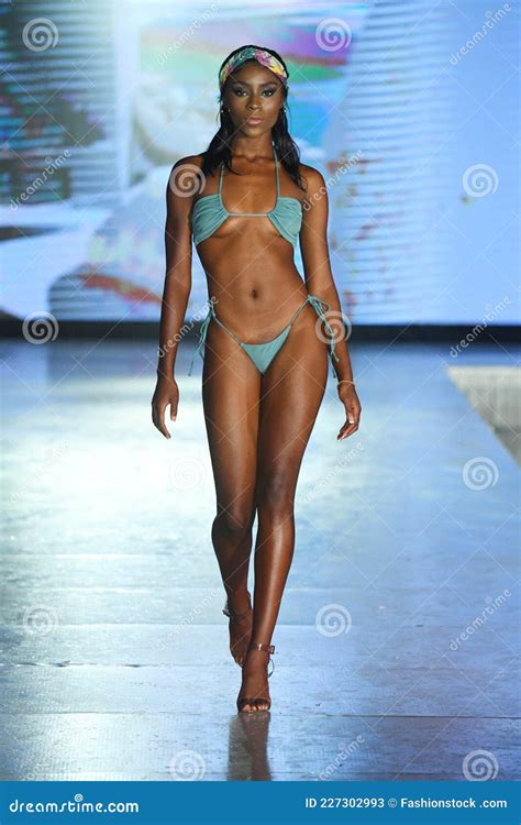 A Model Walks The Runway For Almost Naked Swim Show Editorial Stock Photo Image Of Collection