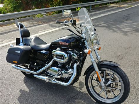 La 883 sportster superlow che abbiamo provato monta una lunga serie di accessori che le conferiscono un'aria decisamente glam: Harley Davidson Sportster XL1200T SuperLow | Harley ...